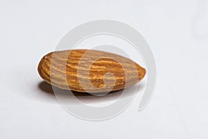 Single almond closeup isolated