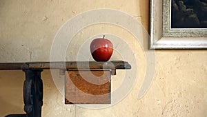 Single Apple On Antique Table