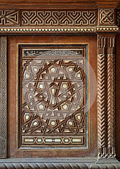 Single arabesque sash of an old mamluk era style cupboard with geometrical decorations photo