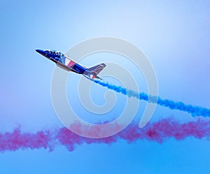 Single Armee El`Air Jet Performing Stunts at Airshow
