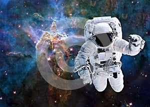 Single astronaut near Mystic Mountain of Carina Nebula