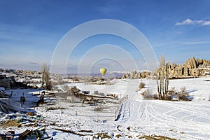 Single ballon rising in cappadocia winter