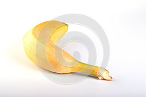 Single banana against white background