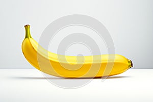 A single banana isolated on white background. Fresh raw yellow banana isolated on white background