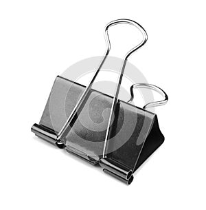 A single binder peg office, isolated on a white background. The black and metallic paper clip. Clerical pins for papers.