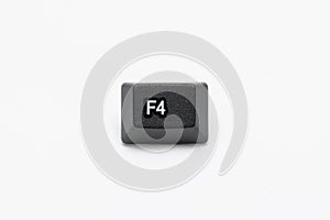 Single black keys of keyboard with different letters F4