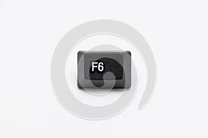 Single black keys of keyboard with different letters F6