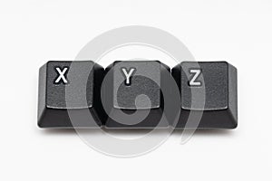 Single black keys of keyboard with different letters XYZ
