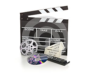 Single, black, open movie clapper or clapper-board with dvd movie disc, film reel, remote control and movie theatre tickets on