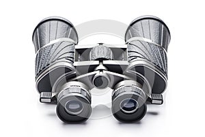 Single black pair of binoculars isolated on a white background.