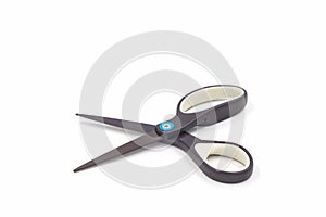 Single black steel scissors isolated