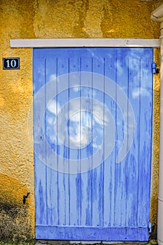 Single, blue, wood, front door, in Sablet, France