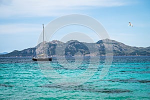 Single Boat on calm sea no clouds