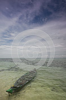 Single Boat/Canoe at Sea