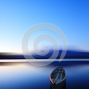 Single boat in long exposure in dusk