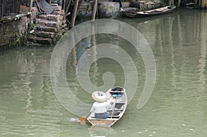 A single boat Tuo Jiang River Fenghuang China