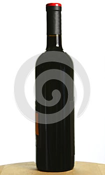 Single bottle of dark red wine