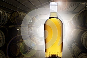 A single bottle of glowing amber  in a barrel warehouse, back lit with light shinning through the open door