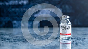 A single bottle vial of Covid-19 vaccine. Medical concept vaccination hypodermic injection treatment. Vaccine and syringe injectio