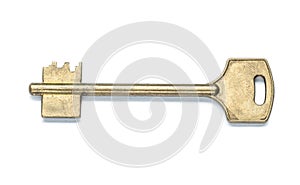 Single brass door key isolated on white