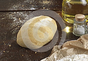 Single bread on a rustic wooden countertop photo