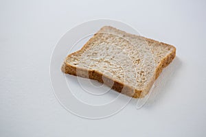 Single bread slice on white background