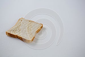 Single bread slice on white background