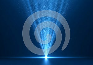 Single Bright Blue Spotlight Beam with Particles in Dark Space