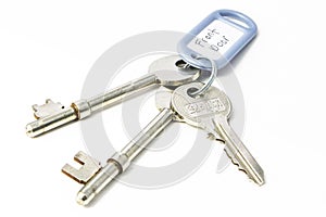 Single bunch of keys with tag isolated on a white background