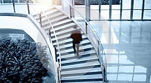 Single business man walking up stairs