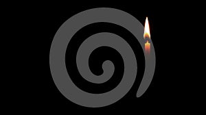 A single candle in the darkness.