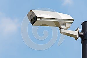 Single CCTV Security camera on clear sky