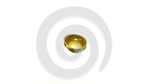 Single Cod liver oil or fish oil gel capsule on white  background.