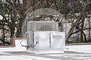 Single Commercial Air Conditioning Unit On Roof of Medical Building