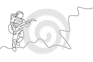 Single continuous line drawing of astronaut playing electric guitar musical instrument in cosmic galaxy. Outer space music concert