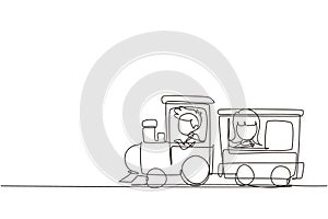 Single continuous line drawing cheerful boy and girl riding on train at amusement park. Happy kids riding toy train or having