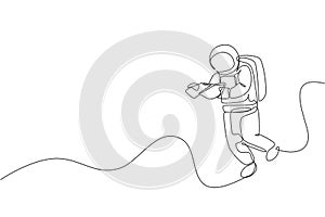 Single continuous line drawing of floating science astronaut in spacewalk reading space map. Fantasy deep space exploration,