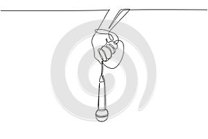 Single continuous line drawing hand holding microphone with lead wrapped around wrist. Man holding microphone in his hand at