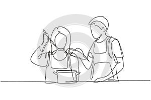 Single continuous line drawing handsome husband holding pan lid and his beautiful wife tasting food using cooking spoon. Cooking
