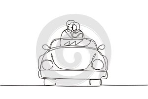 Single continuous line drawing happy Arabian couple on road trip in vintage retro car. Man and woman in vehicle. Married couple