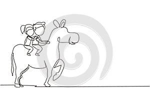 Single continuous line drawing happy cute boy and girl riding donkey together. Children sitting on back donkey with saddle in