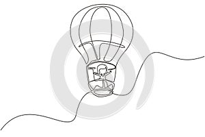 Single continuous line drawing little girl aeronaut in hot-air balloon at sky. Happy kid riding hot air balloon. Children on hot