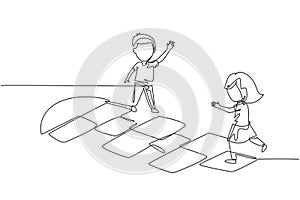 Single continuous line drawing little girl and boy playing hopscotch at kindergarten yard. Happy kids hopping at playground. Hop