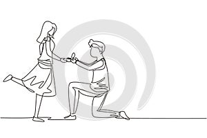 Single continuous line drawing man kneeling offering engagement ring to his girlfriend. Young guy on knees proposing girl to marry