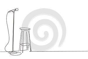 Single continuous line drawing microphone and stool on stand up comedy stage. Equipment at night club or bar for stand up comedian