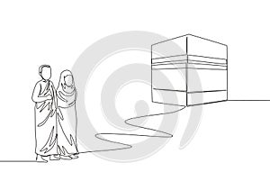 Single continuous line drawing of muslim and muslimah pilgrim walk to holy place Kaabah at Mecca, Saudi Arabia. Muslim holiday,