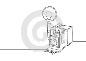 Single continuous line drawing of old retro analog camera medium format with blitz flash light. Vintage photography equipment photo