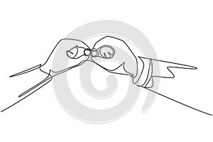 Single continuous line drawing pair of wedding rings held by groom and bride together. Bride and groom make vow of loyalty on