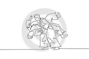 Single continuous line drawing of two young sportive man wearing kimono practice slamming in aikido fighting technique. Japanese photo