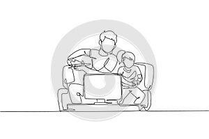 Single continuous line drawing of young father and daughter sitting on sofa while playing video game together at home, happy